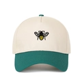 Detailed close-up of the bee embroidery on a beige and green cotton five-panel cap - Dark Green