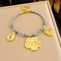 Gold-plated woven bracelet with heart and flower charms featuring turquoise stone inlay - Flower Turquoise Blue Purple Rope Bracelet (B1790)