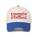 Close-up of red Expensive & Difficult embroidery on a two-tone cotton baseball cap - Off-white/Royal Blue