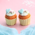 Macro shot of resin cupcake miniatures with blue hearts and pink stars for DIY crafts - Star & Heart Cupcake - Yellow Base