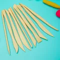 10-piece beige clay sculpting tool set for DIY modeling on a blue background - 10-Piece Plastic Clay Tools Set