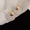 Macro detail of geometric round earrings in silver and gold minimalist dual-tone design - Silver Pin - Gold - Silver