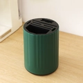 Rotating dark green kitchen knife holder with black top slots on wood table - Dark Green