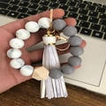 Silicone beaded wristlet keychain with white marble beads and a white glitter tassel - Marble