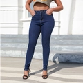 Detailed outdoor shot of high-waisted dark blue skinny jeans with visible fabric texture - S / Dark Blue