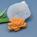 Macro detail of silicone peony mold showing intricate petal texture with finished orange flower - Peony Shape (3)
