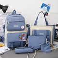 Light blue and beige 5-piece canvas backpack set with cartoon pins and various bags - Blue 5-Piece Set