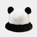 Close-up of plush panda bucket hat featuring soft faux fur texture and black pom-pom ears - Bucket Hat Style / Black