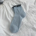 Light blue crew socks with dark grey ruffle trim and ribbed texture for women - One Size / Light Blue