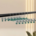 Adjustable silver metal pants hangers with dark green anti-slip clips for skirts - Coated Green