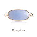 Faceted oval blue glass connector in a polished gold frame for DIY jewelry making - Blue Glass Gold