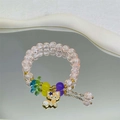 Elegant beaded fox charm bracelet with pink textured beads and gold-tone finish - Orange-pink Stellalou Bursting Flower Bracelet #sz434