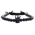 Macro shot of crown beaded bracelet with blue zircon and black metal beads - Blue Zirconia Black Crown Bracelet