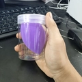 Handheld transparent jar with large purple makeup sponge for smooth foundation application - Cylindrical Box / Deep purple