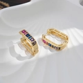 Detailed close-up of luxury rectangular gold hoop earrings with colorful zircon stones - 18K Gold - Colorful Zirconia