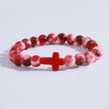 Beaded bracelet with red and white stone beads and a central red cross charm - Red White Pattern Cross Bracelet
