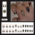 Faux ongles French style avec paillettes noires et dorées et motifs géométriques élégants - Or Noir Scintillant (Type Colle)