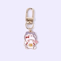 Cute golden metal keychain with a white and purple enamel astronaut rabbit charm - Purple Space Rabbit