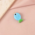 Macro shot of blue and green glass fish pendant with golden ring on pink fabric background - Blue Fish Single Loop (1#) / Gold