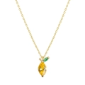 Detailed close-up of a gold lemon pendant necklace featuring yellow and green crystals - Gold Lemon Necklace
