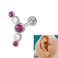 Detail of 16G curved stainless steel labret stud with pink and clear crystal inlay - Curved 2 White+3 Light Red