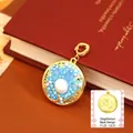 Golden Sagittarius zodiac pendant with blue enamel and pearl on vintage red book background - Sagittarius Style