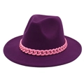 Detail of dark purple fedora hat featuring a stylish pink acrylic thick chain trim - Purple