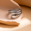 Detailed view of silver snake-shaped adjustable ring with textured scales on ceramic - Steel Color Style 6