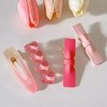 Pink Y2K style hair clips featuring resin heart and cute bow designs for girls - Set of 4 / Heart and Bow Combo