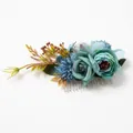 Close-up of Morandi blue silk flowers and green leaves on a silver metal hair comb - FS02-3 Blue