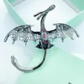 Antique silver dragon brooch with red teardrop gemstones and detailed scale wings - Silver Gray