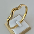 Elegant wave-shaped 18K gold-plated stainless steel bangle with sparkling crystals - Wave Shape Gold Bangle