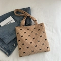 Borsa tote beige in velluto a coste con fiocchi neri e motivo a rombi trapuntato - Marrone