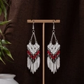 Ethnic bohemian silver tassel earrings with flower hollow design and red bead accents - Red Silver (E1222-1)