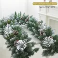 2M Christmas frosted garland with white flocking, pine cones and red berries on a mantle - 2m Flocked Garland