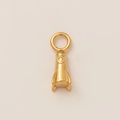 Detailed macro view of a 18K gold plated stainless steel rocket pendant with top ring - Rocket