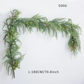 Detailed view of 180cm artificial cedar garland with green berries weighing 500g - Green Berry Garland 1.8M