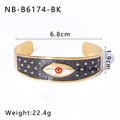 Macro detail of gold enamel evil eye bracelet with dimensions 6.8cm and 1.9cm - Black Evil Eye Style (NB-B6174-BK)