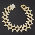 Gouden hiphop-armband met doornschakels en fonkelende kristallen op een zwarte achtergrond - 18cm(7inch) / Goud