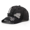 Close-up of distressed details and ripped holes on a black washed denim baseball cap - One Size(Adjustable) / Washed Black (A)