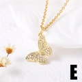 Elegant gold butterfly pendant necklace with clear zircon stones on a white background - Butterfly