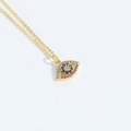 Goldene Evil-Eye-Halskette mit blauem Stein und bunten Zirkon-Einlagen im Detail - Buntes Hohles Auge