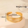 Breites, mehrlagiges Edelstahl-Manschettenarmband in Goldoptik mit gedrehtem Metalldraht - Mehrlagiger Web-Stil / Gold