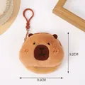 Brown plush capybara coin purse with hook and zipper, 9.6cm compact storage keychain - Squinting Capybara