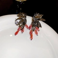 Detailed leaf earrings with faceted red crystal droplets and clear stone accents - 66# Silver Earring Post - Gun Black Leaf Red Faceted Crystal