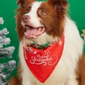 Close-up of a festive red Christmas dog bandana with Merry Christmas print and gingerbread man - Red Gingerbread Man Style