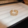 Close-up of adjustable champagne gold ring with pearls and square zircons in a box - Vintage Hollow Pearl Zircon Ring / Gold
