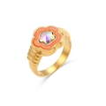 Detailed macro view of a gold flower ring with orange enamel petals and crystal center - US 6 / Acrylic Colorful Rhinestone Flower / Orange