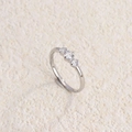 Three-stone titanium steel ring with round brilliant cut crystals in a polished silver finish - Steel Color White Zircon