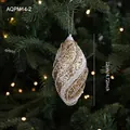 Golden olive-shaped Christmas ornament with white bead waves and glitter finish, 12cm - Oval Foam Ball
